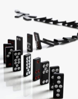 Falling dominoes in a chain reaction